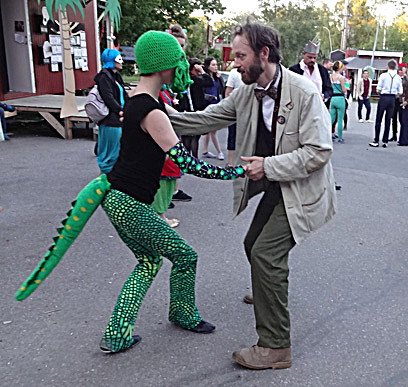 The Doctor dances with an alien.